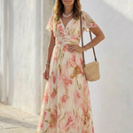 Margaux | Vestido maxi floral de mangas curtas em V
