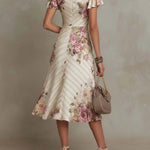 Vestido midi de cetim com padrão floral, elegante e de estilo retro